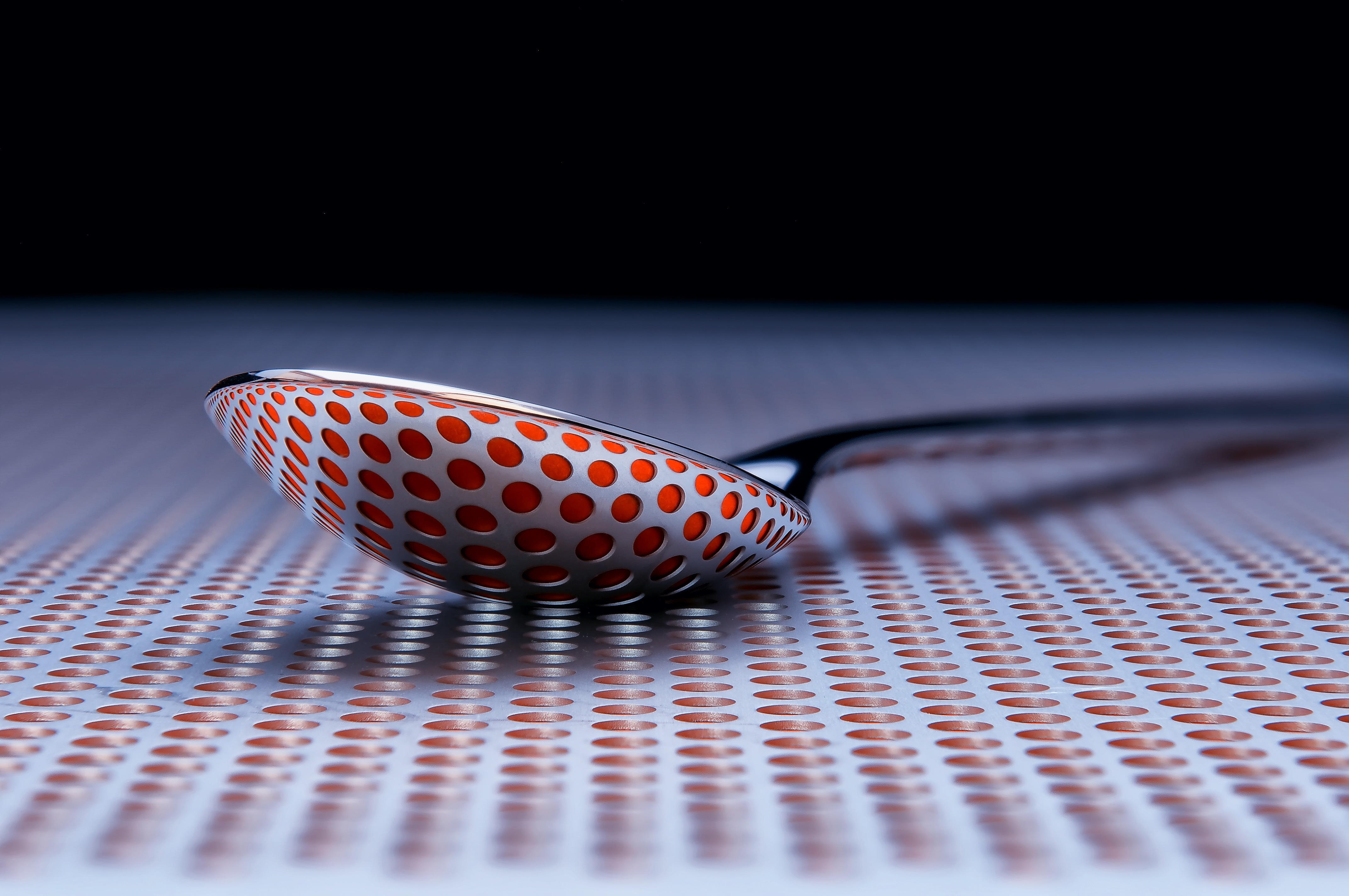 Spoon with dotted background